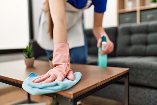 dusting the table